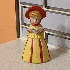 Vintage Ceramic Figurine in Yellow and Red Dinner Bell